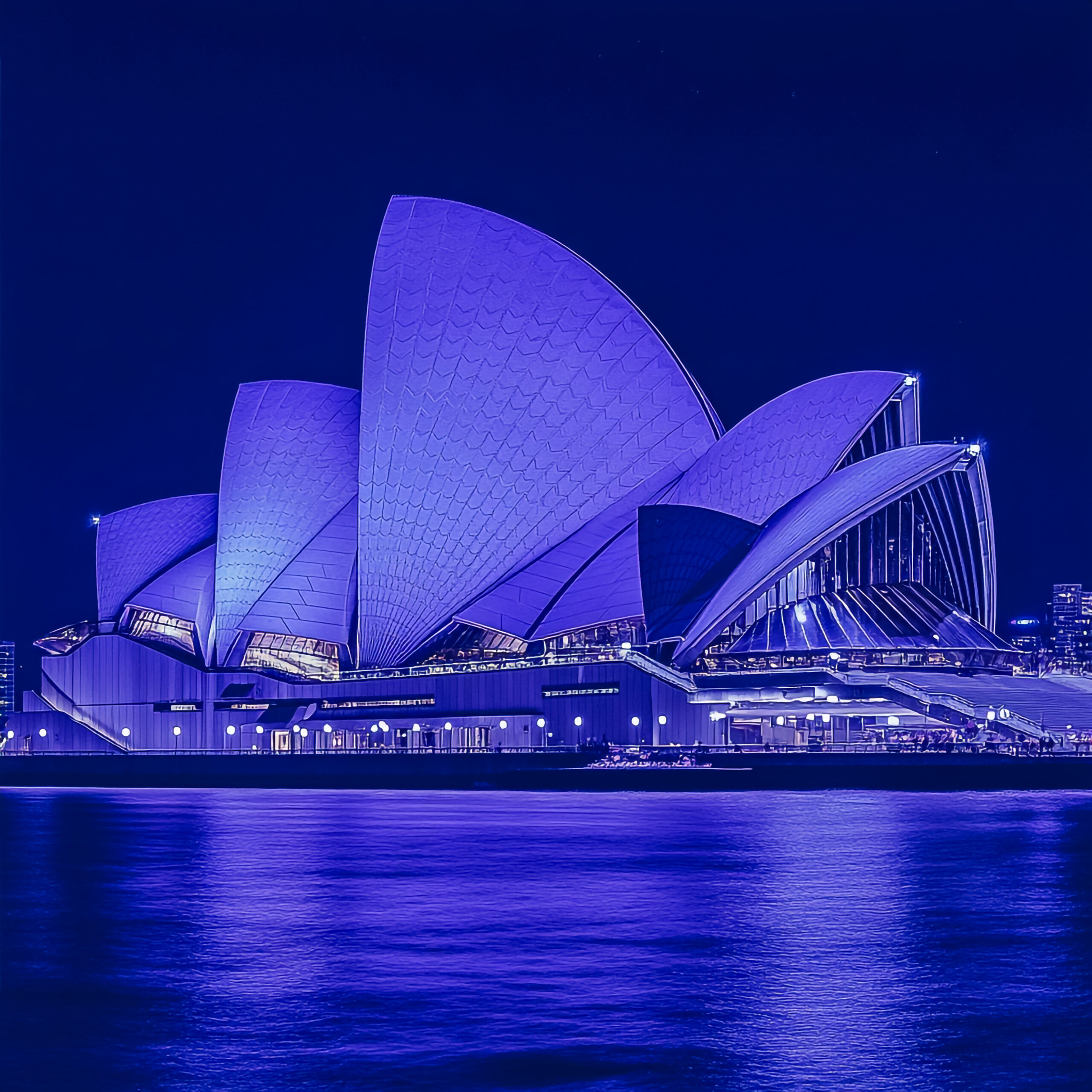 Destinos blue lit up building with word opera it