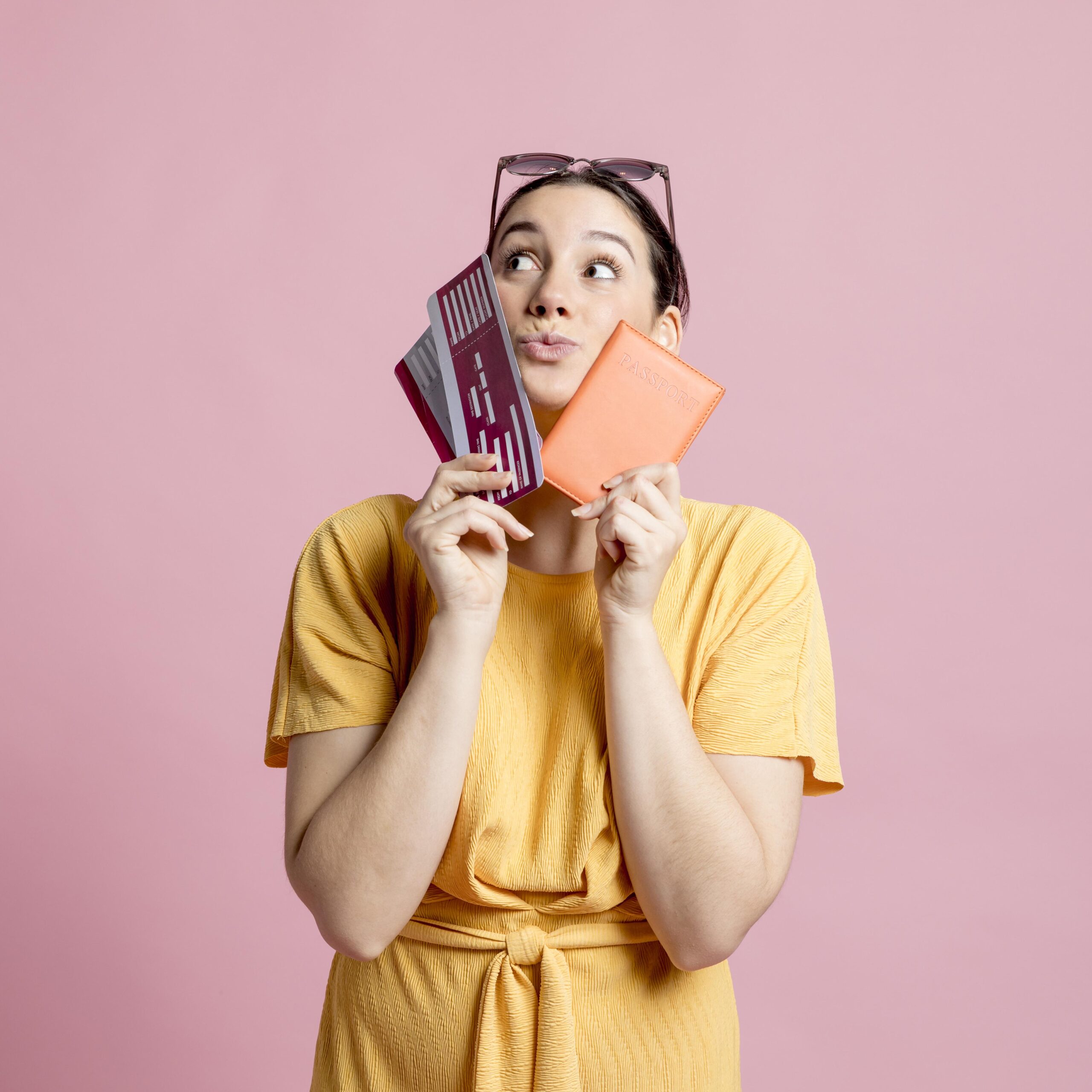 Servicios woman holding passport plane tickets close her face